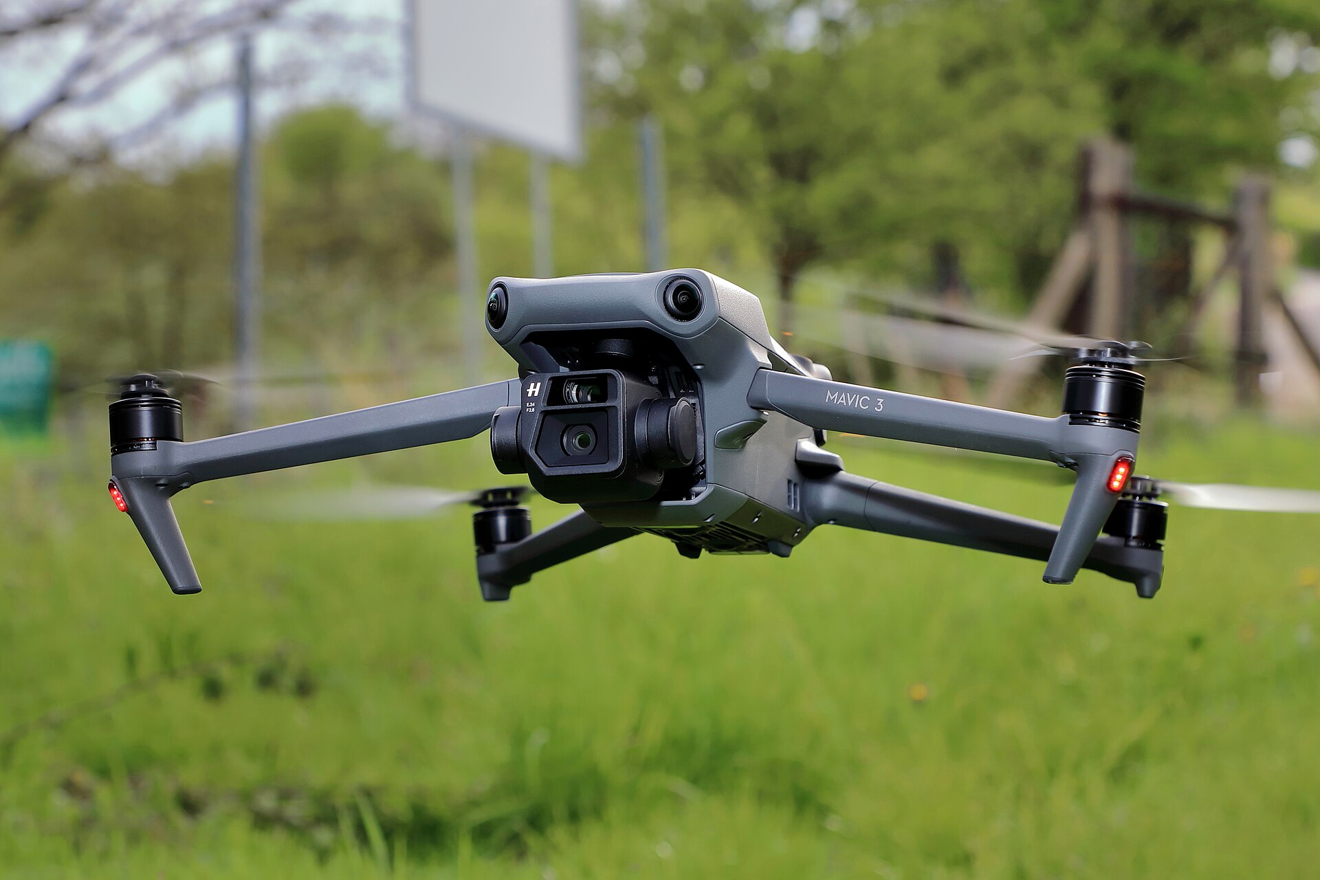 DJI Mavic 3 in flight, dual-lens Hasselblad gimbal camera on the nose